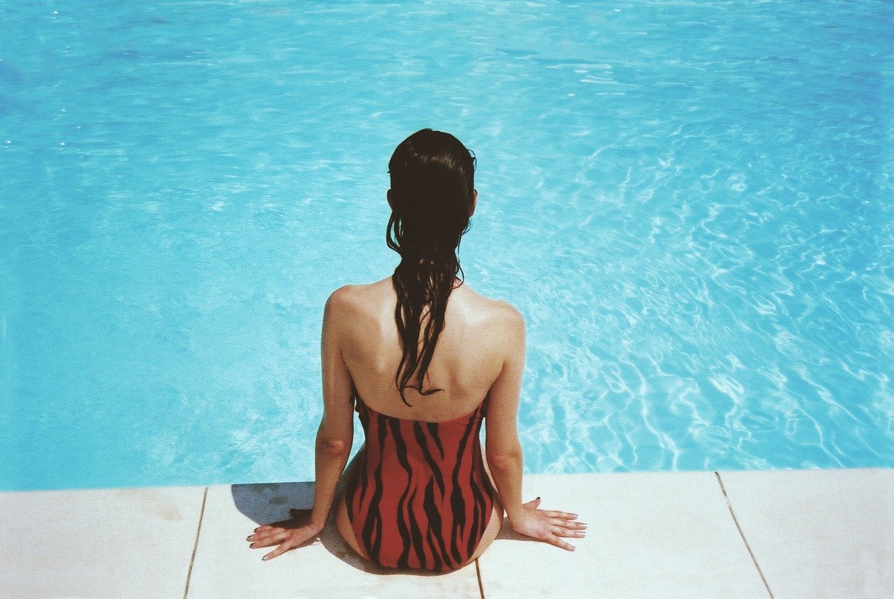 woman, sitting, poolside-918532.jpg